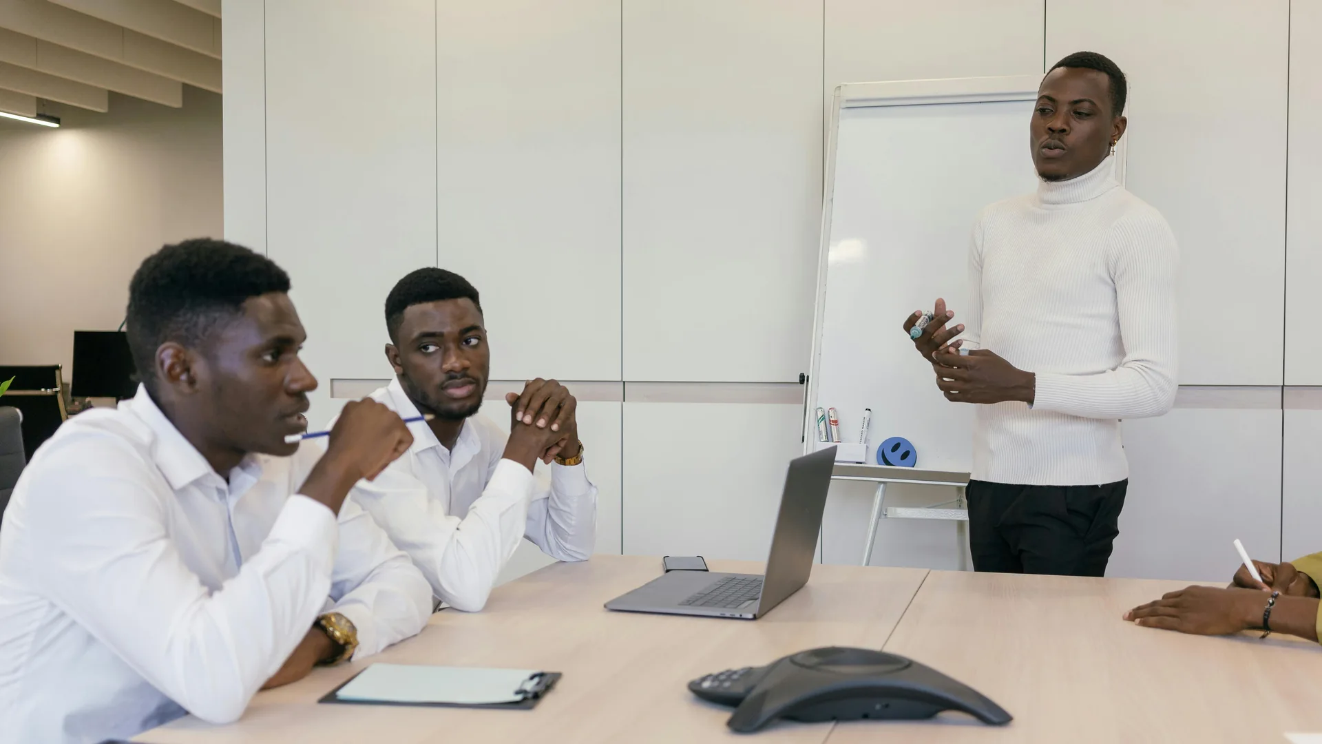 African business professionals in a boardroom presentation